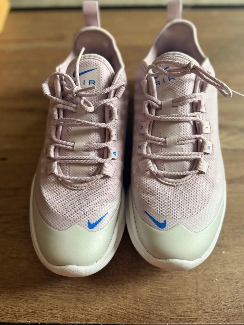 Nike Pink Lavender Mesh Athletic Sneakers with Blue Swoosh